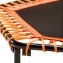 Detailaufnahme: Oranges Salta Fitness Trampolin (Ø 128 cm) mit Griffstange und schwarzem Sprungtuch.