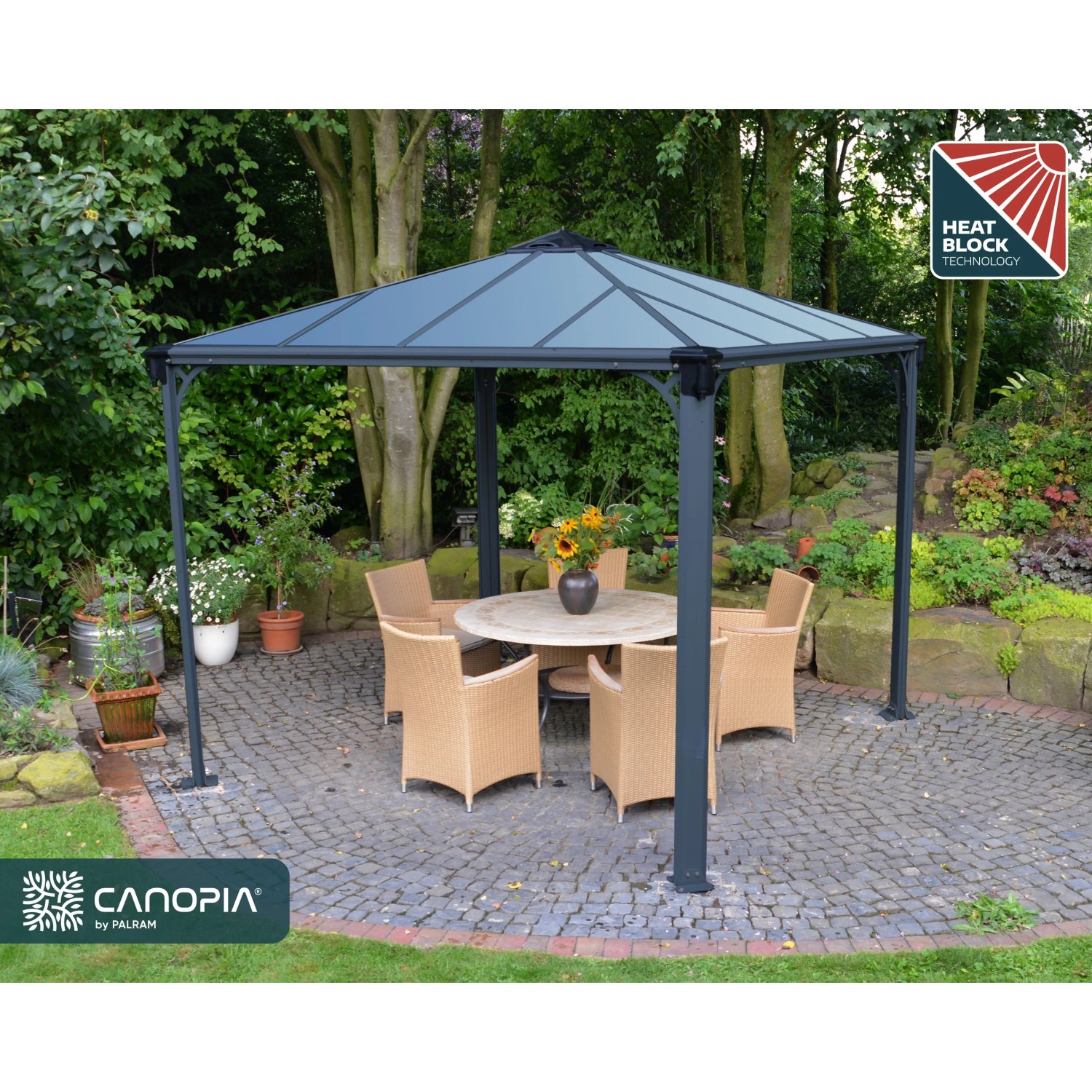 Canopia Gartenpavillon Palermo 3x3 in Anthrazit mit Tisch und Stühlen im Garten.