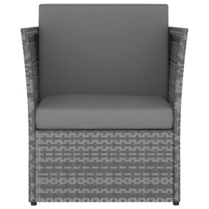 Anthrazitfarbener Furnicato Gartensessel mit Hocker aus Polyrattan und grauen Polstern.