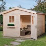 Unbehandeltes Weka Holz-Gartenhaus mit Satteldach und geöffneter Tür, Blick ins Innere mit Möbeln.