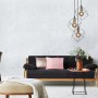 Näve Pendelleuchte Canto, 3-flammig, 146 cm, im Industrial Style über Sofa.