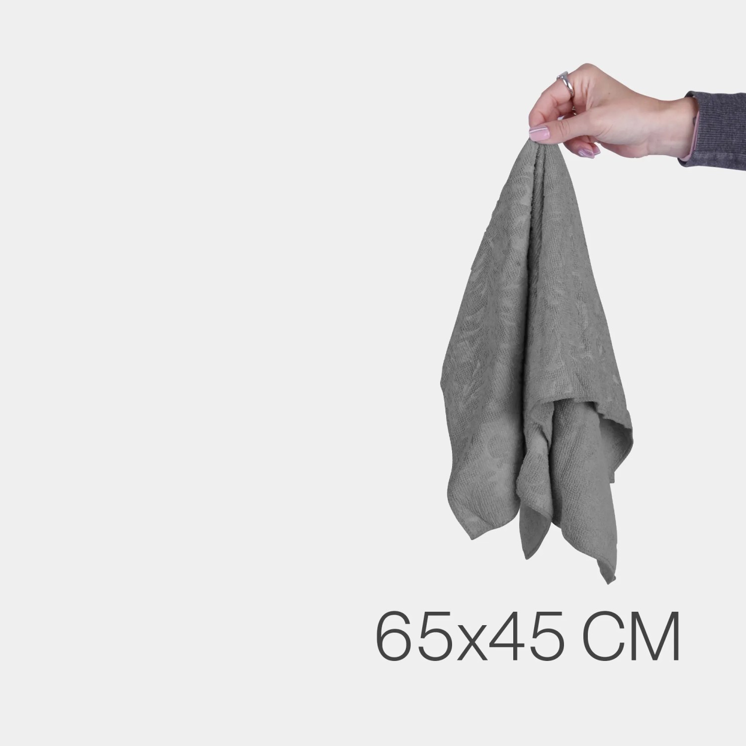 Anthrazitfarbenes Microfaser Geschirrtuch (65x45 cm, 4er-Pack) in Hand gehalten.