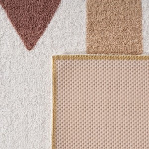Detailansicht Ayyildiz Kinderteppich Coco Creme Ø 120cm mit rutschfester Rückseite.