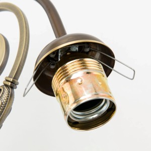 Detailaufnahme einer Glashaltefeder (10er Set) für Lampen, zur Befestigung von Glasschirmen.