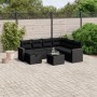 Schwarze 8-tlg. vidaXL Garten-Sofagarnitur aus Poly Rattan mit Kissen auf einer Terrasse.