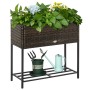 Outsunny Blumenkasten aus Rattan mit Füßen und Ablage, bepflanzt mit Blumen.