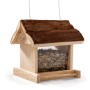 CULT at home Vogel Futterhaus aus Holz mit Rindendach, gefüllt mit Vogelfutter, zum Hängen.