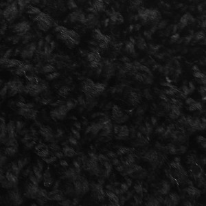 Detailaufnahme: Schwarzer Shaggy Teppich Barcelona mit weichem Flor. Wohnteppich nach Maß.