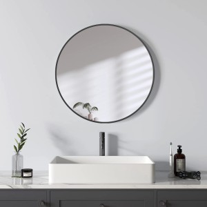 Runder DSK Designspiegel Picasso, Ø 50 cm, mit schwarzem Rahmen im Badezimmer.
