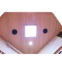 Innenansicht der Dewello Infrarotkabine Sauna aus Hemlock Tannenholz mit Deckenleuchte.