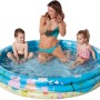 Happy People Peppa Pig Planschbecken (Ø 150 cm) mit Kindern und Erwachsenen im Wasser.