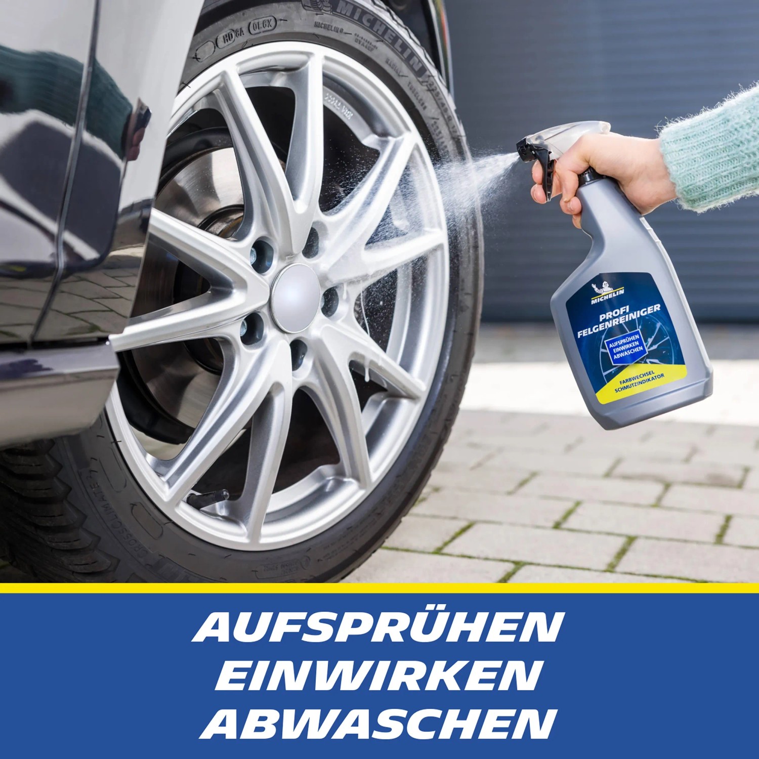 Anwendung von Michelin Profi Felgenreiniger auf einer silbernen Felge.