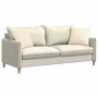 Zwei cremefarbene Sofakissen aus weichem Cordstoff, 45x45 cm, auf einem hellen Sofa.