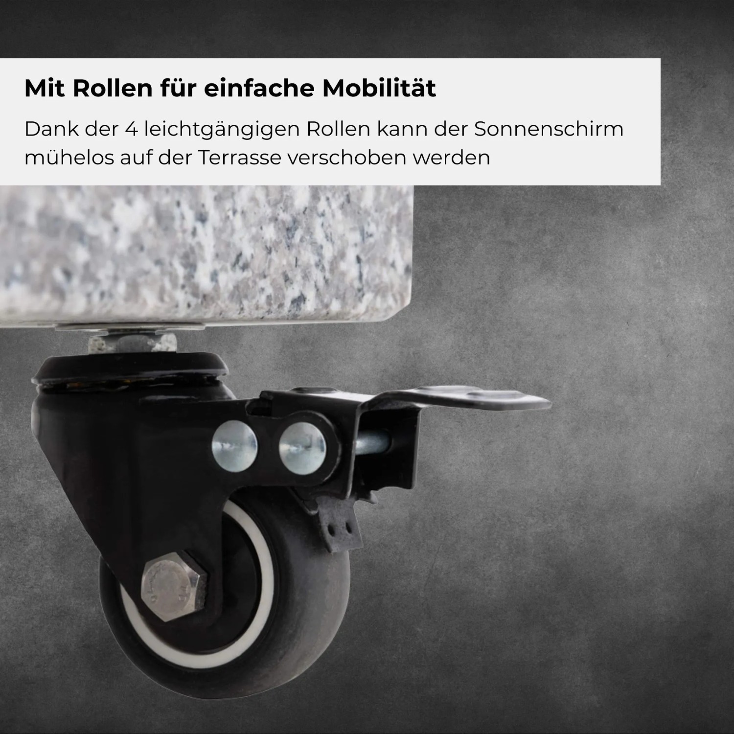 Detailaufnahme: Rolle am hellen Granit Schirmständer MYZONE 70 kg für flexible Mobilität.