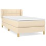 Cremefarbenes Boxspringbett 100x200 cm mit Stoffbezug, inklusive Matratze und Topper.