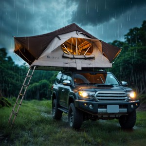 Juskys Autodachzelt Lago (120x210 cm) in Schwarz/Grau auf einem Auto im Regen.