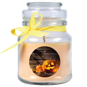 HS Candle Duftkerze Halloween Creme Bonbon im Glas mit Kürbis-Motiv und gelber Schleife.