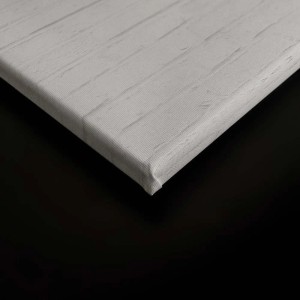 Detailaufnahme eines schwarz-weißen Leinwandbilds in Steinoptik. Wandbild für Wohnraum.