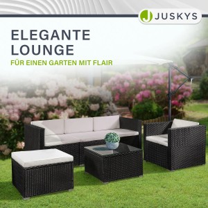 Schwarze Juskys Polyrattan Lounge Punta Cana L mit creme Bezügen im Garten.