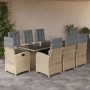 9-teilige Garten-Essgruppe aus Poly Rattan mit Kissen in Beigemischung und schwarzer Glasplatte.