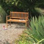 Acamp Gartenbank Woody 2-Sitzer aus Teakholz (FSC®) im Garten.