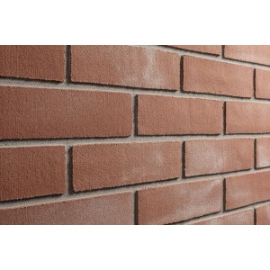 Nahaufnahme: Elabrick Verblender Siena, rot-matte Steinoptik für Fassade und Wand.