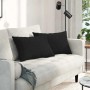 Zwei schwarze Sofakissen (60x40 cm) aus Stoff von vidaXL auf einem weißen Sofa.