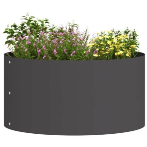 Schwarzer vidaXL Pflanzenring aus Stahl, 40x40x20 cm, bepflanzt mit bunten Blumen.
