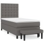 Graues Boxspringbett (80x200 cm) mit Matratze, Kopfteil und Bank aus Kunstleder.