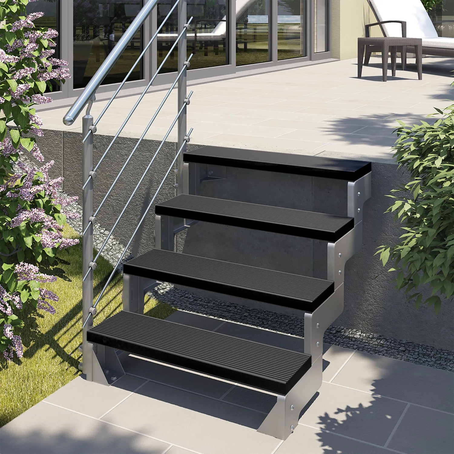 Außentreppe mit anthrazitfarbenen Trimax Stufen Gardentop (80 cm) im Garten.