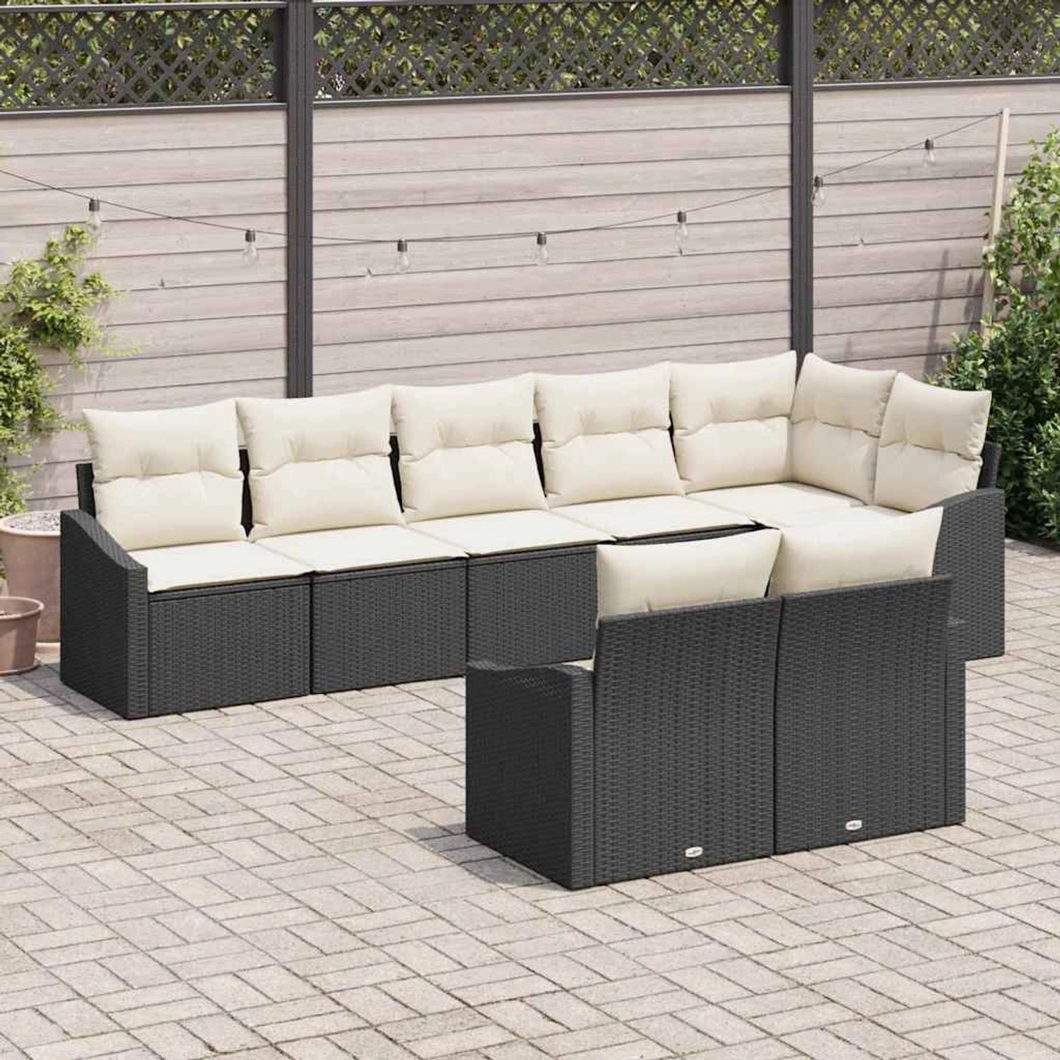 Schwarzes 8-teiliges Garten-Sofa-Set aus Poly Rattan von vidaXL mit beigen Kissen.