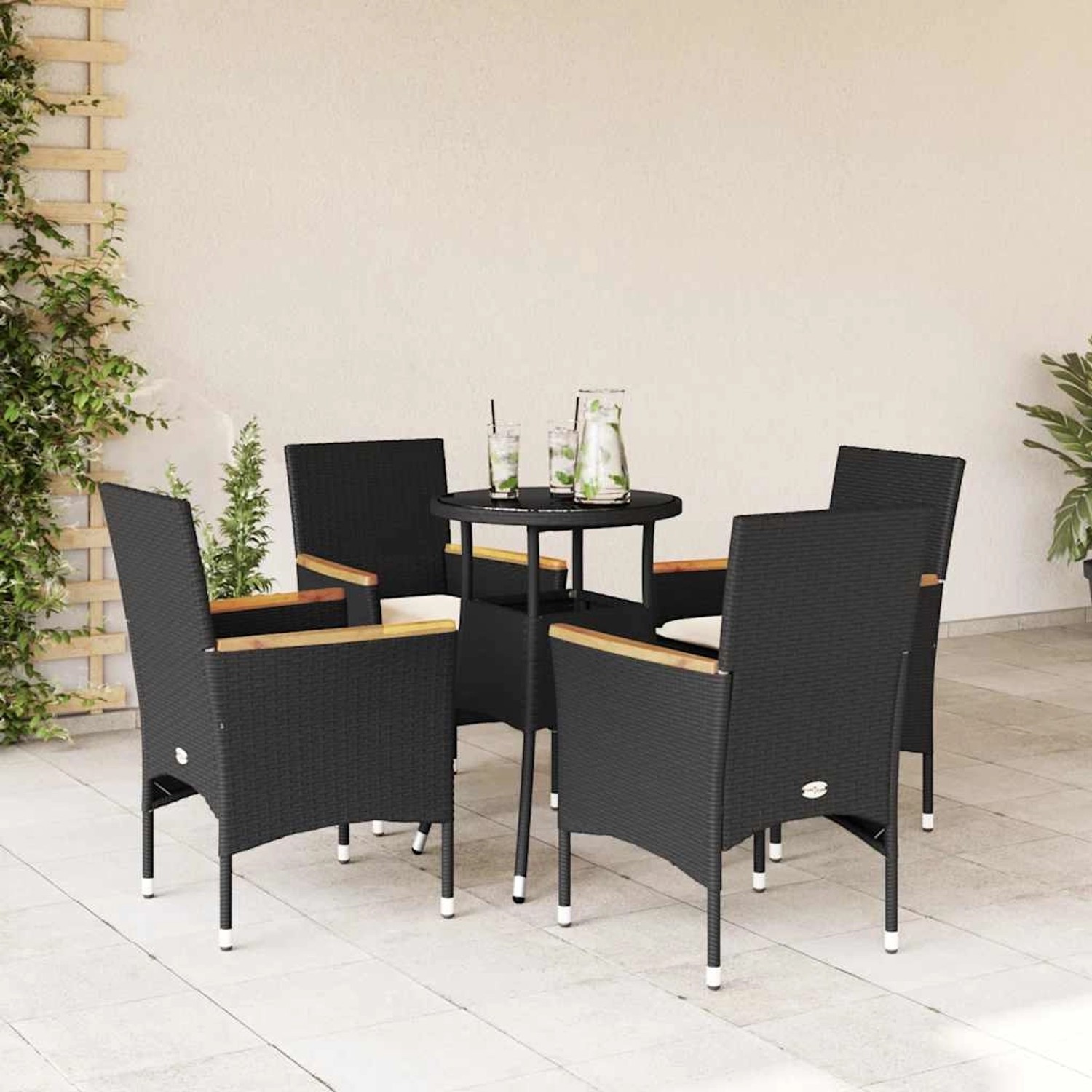 Schwarze 5-tlg. Garten Essgruppe aus Polyrattan mit Glasplatte und Kissen.