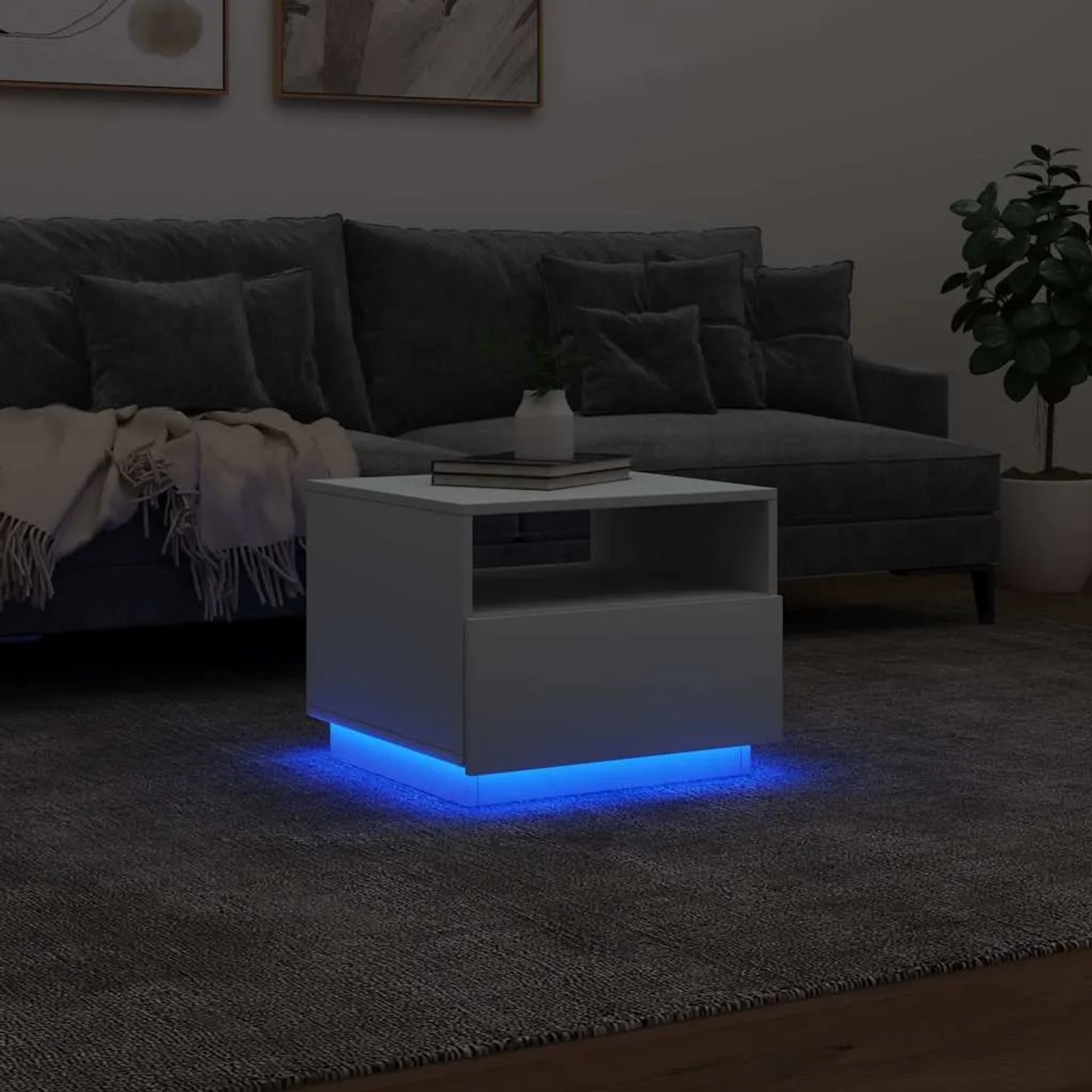 Weißer vidaXL Couchtisch mit LED-Beleuchtung (50x49x40 cm) im Wohnzimmer.