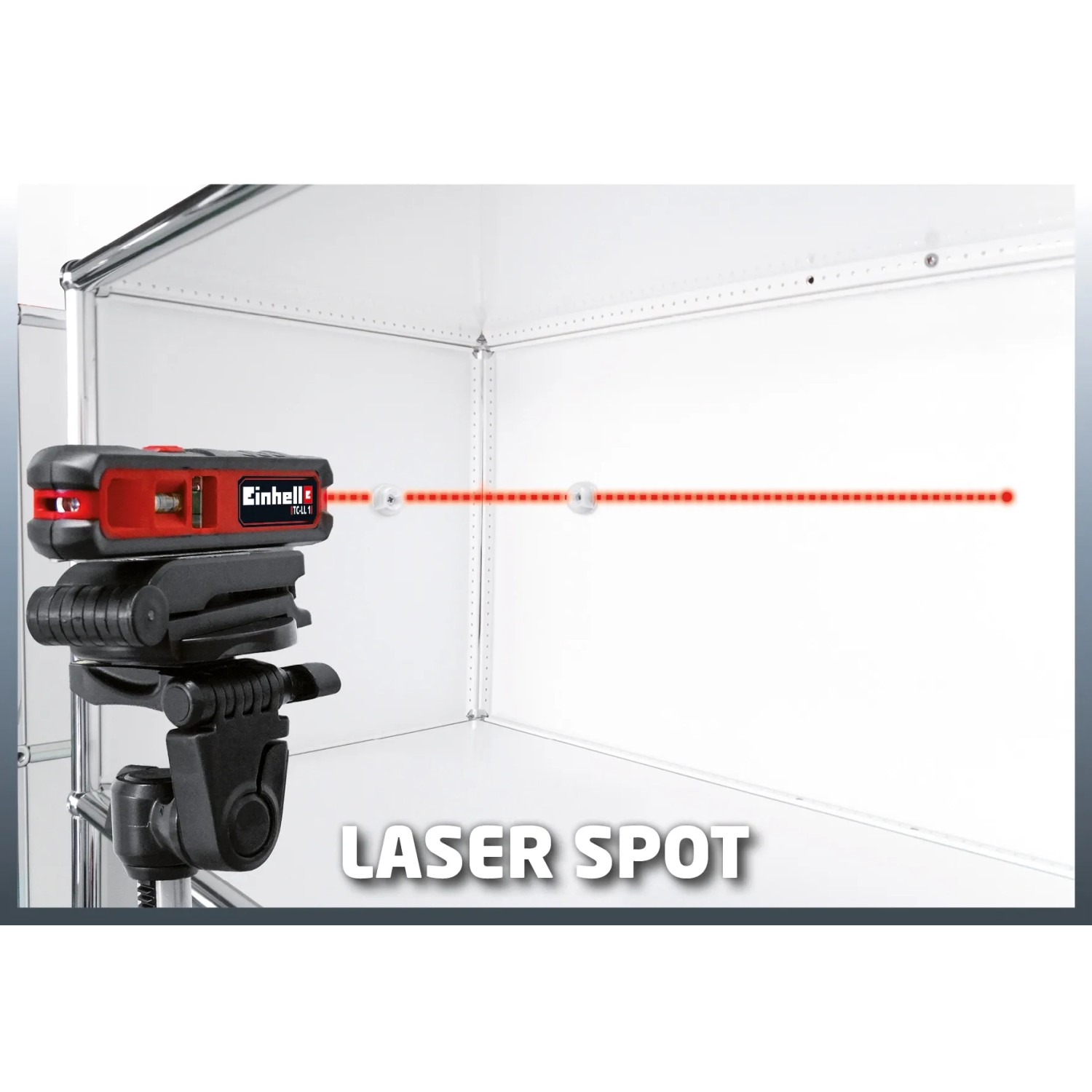 Einhell TC-LL 1 Lasernivelliergerät mit rotem Laserstrahl auf Stativ für präzise Messungen.