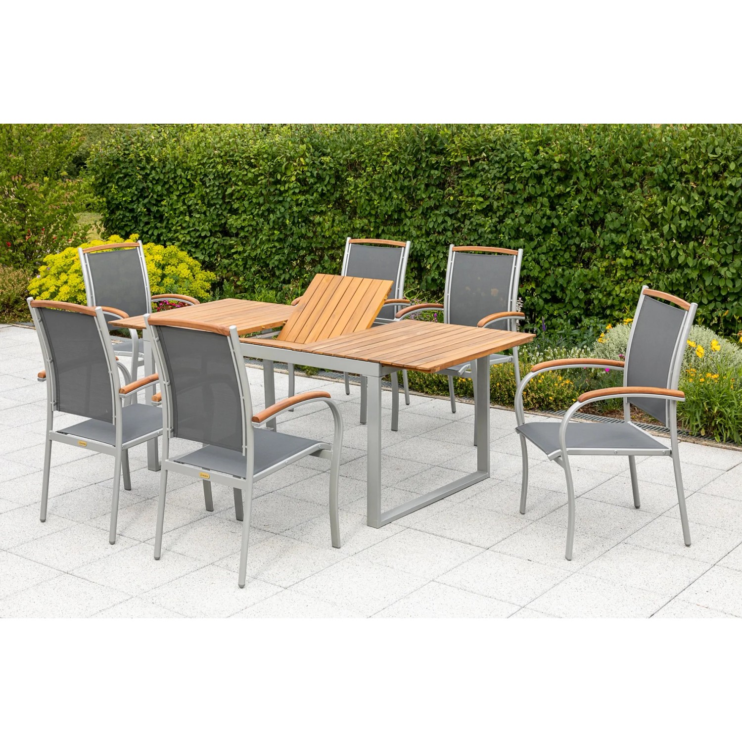 Merxx Gartenmöbel Siena 7-teilig: Gartentisch mit Akazienholzplatte und 6 Stapelsessel mit Textilbespannung.