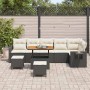 Schwarzes 9-teiliges vidaXL Garten-Sofa-Set aus Poly Rattan mit Tisch und Hockern.