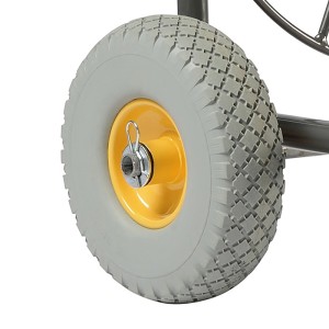 Detailaufnahme Rad des Haemmerlin Schlauchwagens mit PU-Bereifung und gelber Felge.