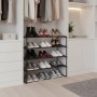 Schwarzes Metall Schuhregal mit 4 Ebenen, gefüllt mit Schuhen, im Kleiderschrank. Stapelbares Stecksystem für Ordnung.