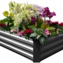 Anthrazitfarbene Garden Pleasure Hochbeet- und Beetumrandung aus Metall, bepflanzt mit Blumen.