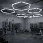 Modulare LED Deckenleuchte in Sechseck-Form, kaltweiß, für Werkstatt, Garage oder Fitnessstudio.