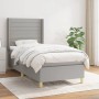 Hellgraues vidaXL Boxspringbett 90x190 cm mit Matratze und hohem Kopfteil.