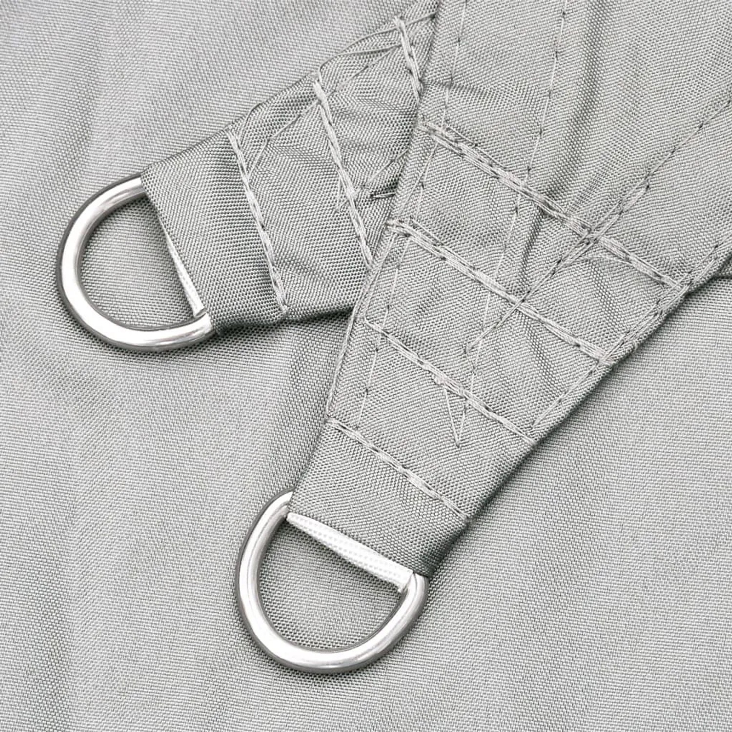 Hellgraues Sonnensegel aus Polyester Oxford mit verstärkter Ecke und robustem D-Ring zur Befestigung.