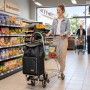 Sekey Treppensteiger Einkaufstrolley mit Rucksack, schwarz, im Supermarkt.