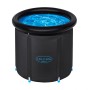 Bestway LAY-Z-SPA Eisbad Glacial Zen, runder, schwarzer, aufblasbarer Whirlpool mit blauem Wasser.
