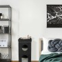 Schwarze Relaxdays Katzenhöhle aus Polyester, faltbar, mit 3 Ebenen und einer Katze auf der obersten Plattform.
