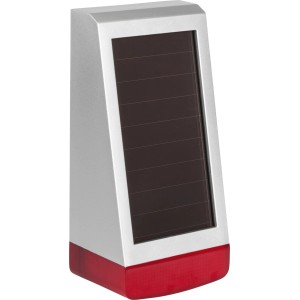 Homematic IP Alarmsirene außen, silber-rot mit Solarpanel. Akustische und optische Warnung für Hausautomation.