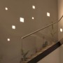 Eingebaute Paulmann LED-Einbaupanels Veluna, eckig, 4000 K, in Treppenhauswand.