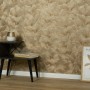 Erismann Vliestapete Fashion for Walls Floral Glow Gold mit floralem Muster und Glanzeffekt.