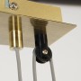 Detailaufnahme der braun-beigen Näve Pendelleuchte Tilde mit messingfarbenem Gestell.