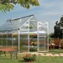 CANOPIA Gewächshaus Mythos Silber 5,7 m² mit geöffneter Tür und Pflanzen auf Regalen im Garten.